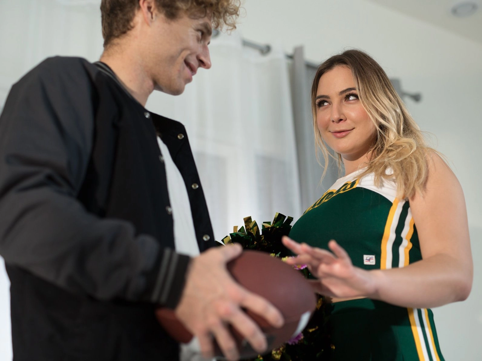 Cheerleader Blair Williams and the QB